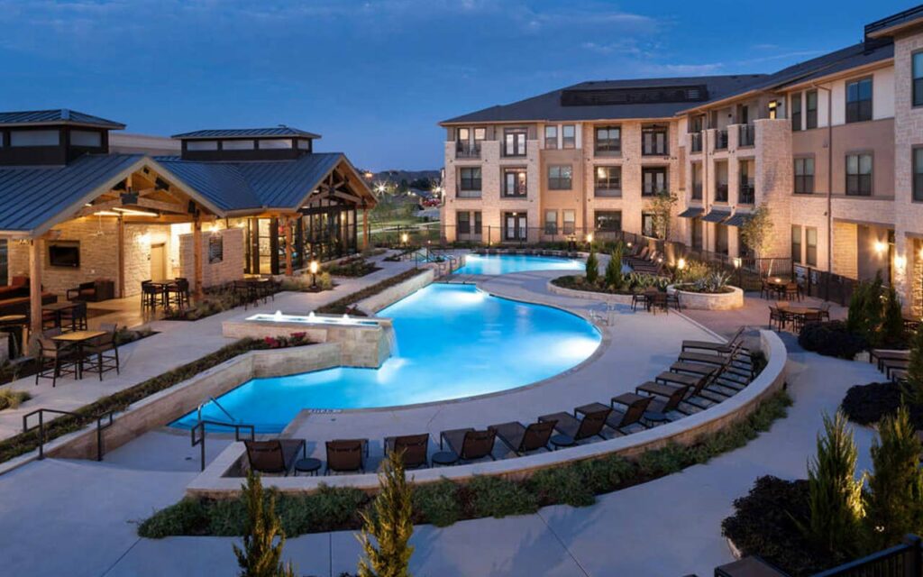 Sagestone Village Apartments property exterior and swimming pool